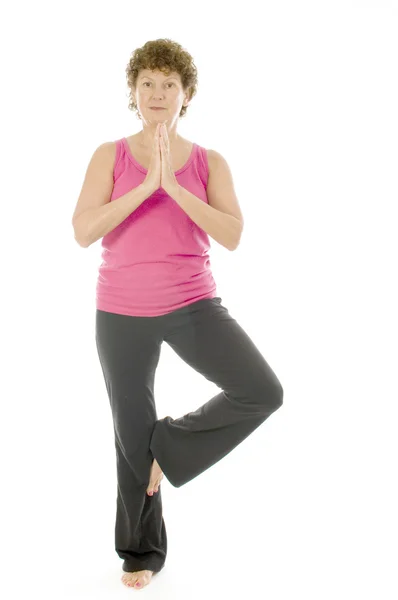 Middle age senior woman fitness yoga pose — Stock Photo, Image