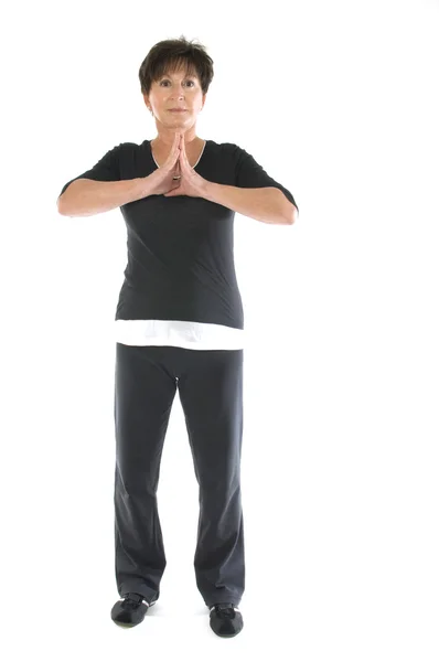Middle age senior woman yoga position stretch — Stock Photo, Image