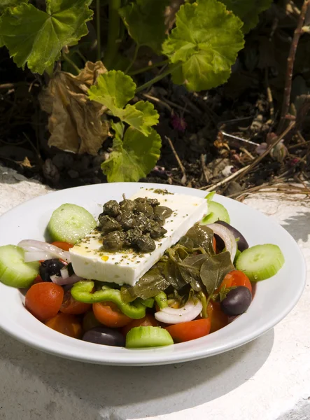 Greek salad in sunlight Santorini — Stock Photo, Image