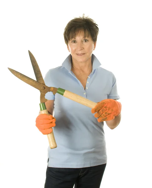 Cute middle age woman garden hand tool hedge trimmer shears — Stock Photo, Image