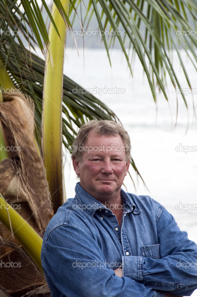 man in tropical setting