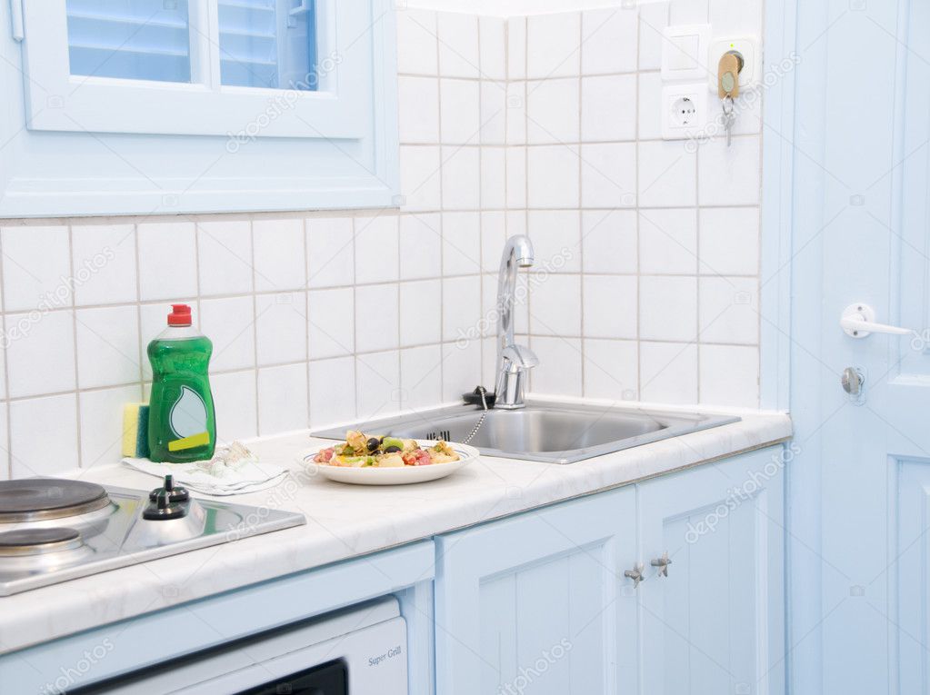 interior Greek island motel apartment kitchen