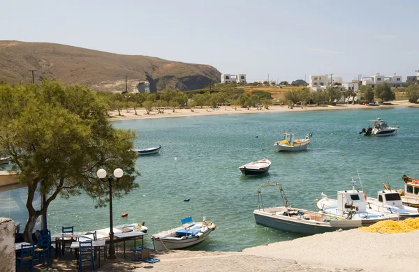 Harbor and beach Pollonia Milos Cyclades Greek island Greece — Stock Photo, Image