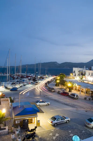 Adamas Milos Cyclades Greek island town at dusk waterfront harbor — Stock Photo, Image