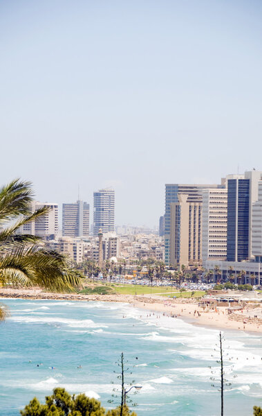 skyline Tel Aviv Israel beach with high rise hotels offices