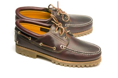 casual rugged mocassin style men leather shoes clipart