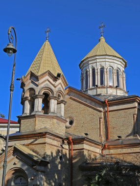 BATUMI,GEORGIA-DECEMBER 31:Armenian Apostolic Church Surb Christ Amenaprkich and Lamp Post.December 31,2021 in Batumi,Georgia.