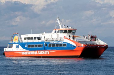 RHODES,GREECE-OCTOBER 02:Greek Ferry leaving  at Rhodes Port. October 02,2013 in Rhodes, Greece