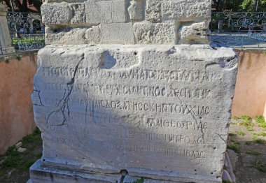 ISTANBUL,TURKEY-OCTOBER 30:Ancient carvings and writing on the marble of the Column of Constantine.October 30,2021 in Istanbul,Turkey