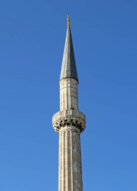 Minaret of The Hagia Sophia with blue sky background in Istanbul, Turkey