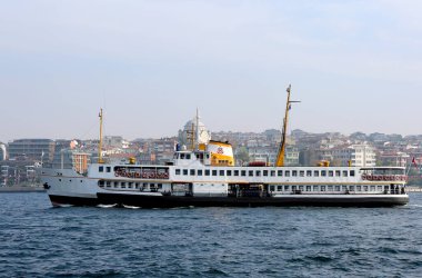 ISTANBUL,TURKEY-OCTOBER 30: Traditional Passenger Ferry aka Vapur arriving to Uskudar  Pier. October 30,2021 in Istanbul, Turkey
