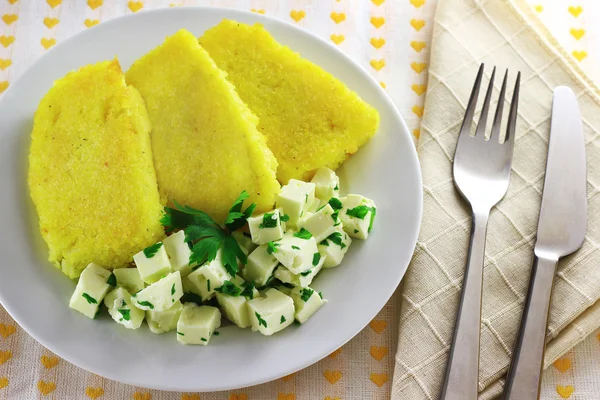 Sliced polenta with cheese — Stock Photo, Image