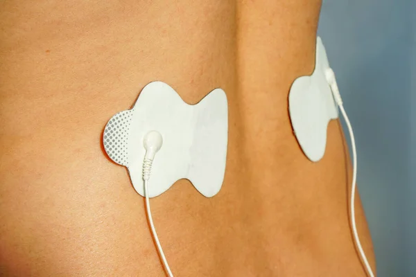 Electrical stimulation massage for lower back pain