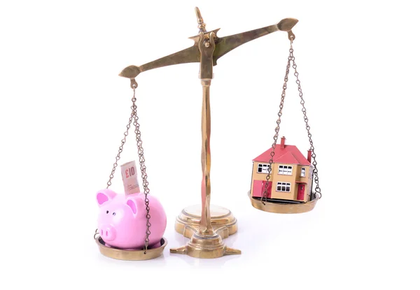 Piggy bank house scales — Stock Photo, Image