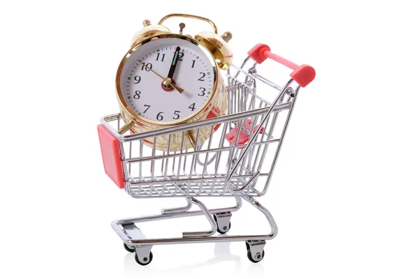 Relógio em tolley compras — Fotografia de Stock