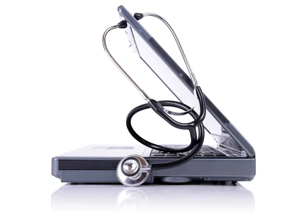 Stethoscope and laptop — Stock Photo, Image