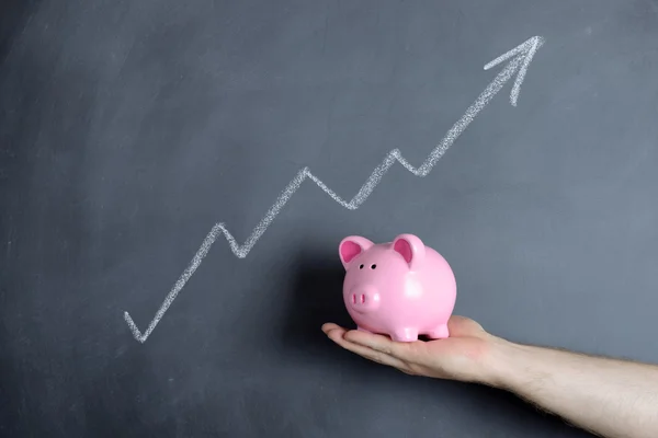 Piggy bank growth chart — Stock Photo, Image