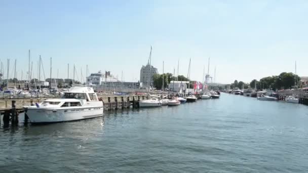 Marina of Warnemuende and parts of the old town can be seen. — Stock Video