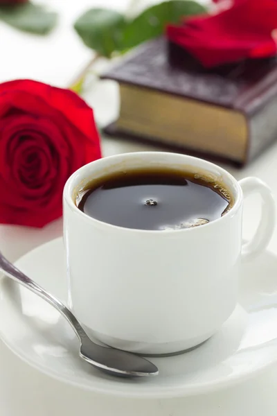 A Cup of coffee with a book and a rose. — Stock Photo, Image