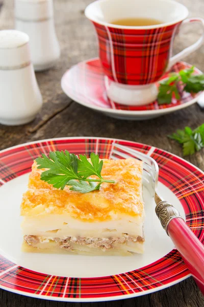 Potato gratin with cheese and meat. — Stock Photo, Image