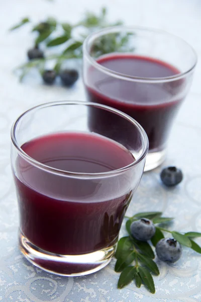 Blueberry juice in a glass. — Stock Photo, Image