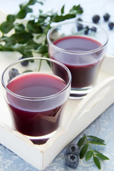 Blueberry juice in a glass. — Stock Photo, Image