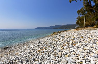 Beach at Kardamyli village in Greece clipart