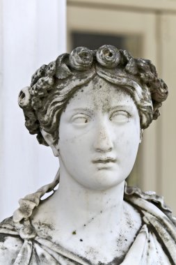 Ancient Greek statue outside of a temple