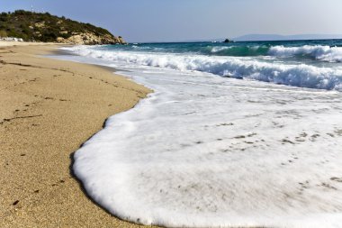 Beach at the mediterranean coast in Greece clipart