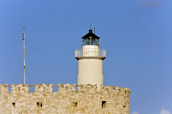 Lighthouse over a castle at Rhodes in Greece — Stock Photo, Image