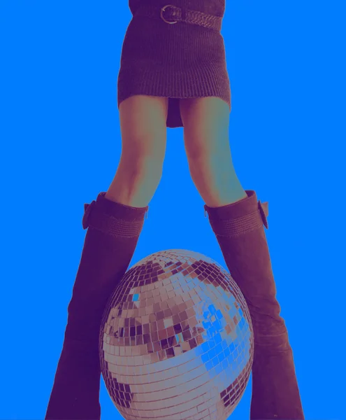 Girls legs and glitterball — Stock Photo, Image