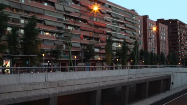 Panning timelapse nighttime traffic shot from a bridge in barcelona spain — Stock Video