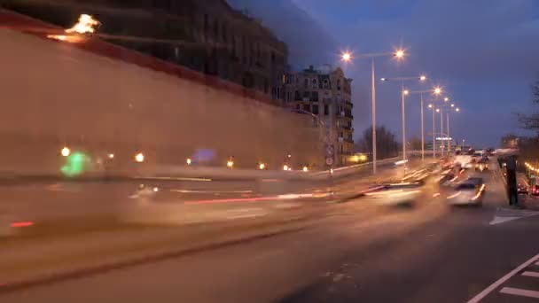 A timelapse of a street scene in barcelona at night — Stock Video