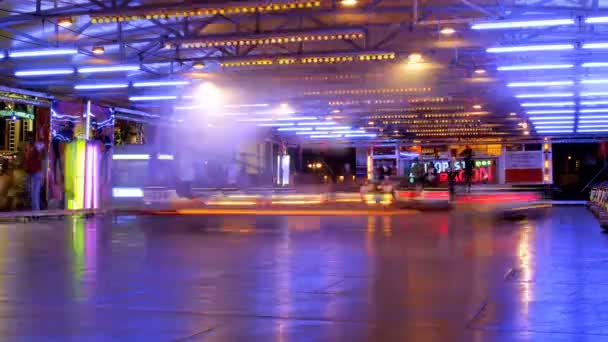 Timelapse of a fast ride carnival in barcelona spain, making light trails — Stock Video