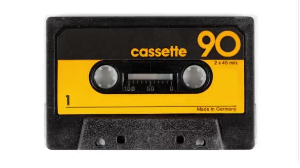 Sequence made from close up shots of cassette music tapes — Stock Video