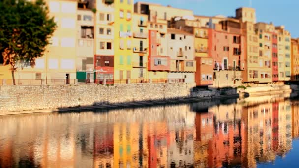 Reflection of the old town of girona, spain, in the river — Stock Video
