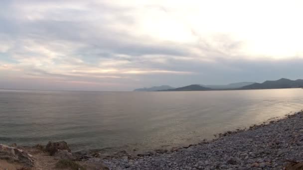 Timelapse de um belo pôr do sol em uma praia em ibiza — Vídeo de Stock