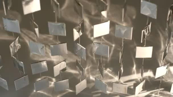 Frescas formas de metal colgando en la pared y en movimiento — Vídeo de stock