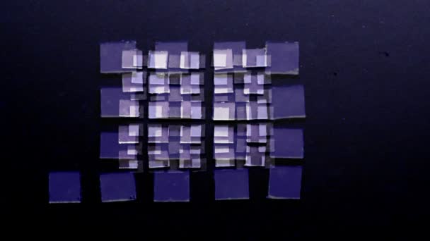 Дзеркальні квадратні фігури, що ростуть у великій квадратній послідовності — стокове відео