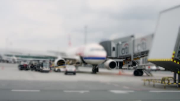 Airplane at docking terminal, prague airport — Stock Video