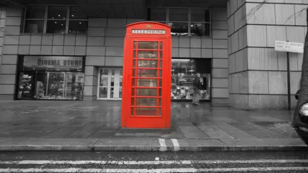 Secuencia de imágenes de las famosas cabinas telefónicas rojas de Londres — Vídeos de Stock