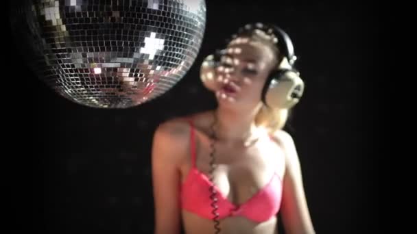 A sexy gogo dancer shot in a studio dancing and posing — Stock Video