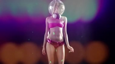 A sexy gogo dancer shot in a studio dancing and posing with a spinning discoball