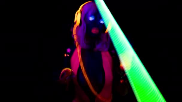 Female dancer in glow UV costume — Stock Video