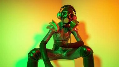 Gasmask covered disco dancer woman 