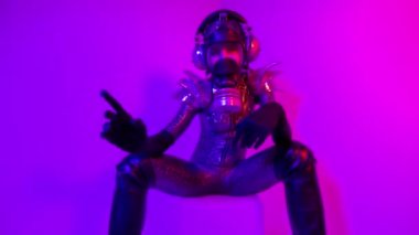 Gasmask covered disco dancer woman 
