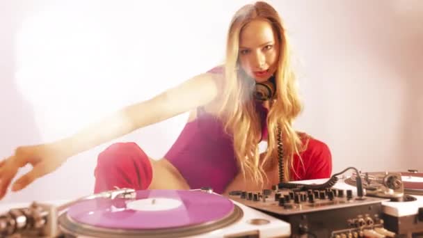 Beautiful Female Red Outfit Playing Turntables — Video Stock