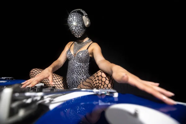 Masked Female Playing Turntables Sparkling Silver Costume — стоковое фото