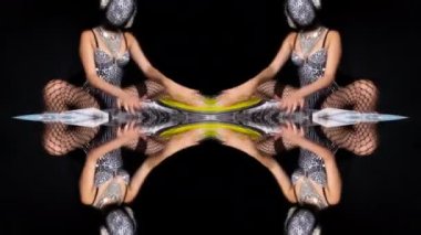 Masked female dj playing with turntables in sparkling silver costume made into abstract pattern