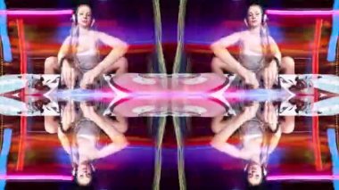 Beautiful female dj playing with turntables in sparkling silver costume made into abstract hypnotic patterm